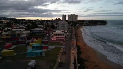 Waves crashing on empty tropical beach with palm tress dense jungle landscape Video stock 276811227