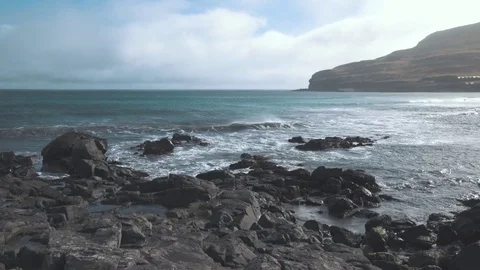 Waves crashing in Faroe Islands Stock Footage 78765035