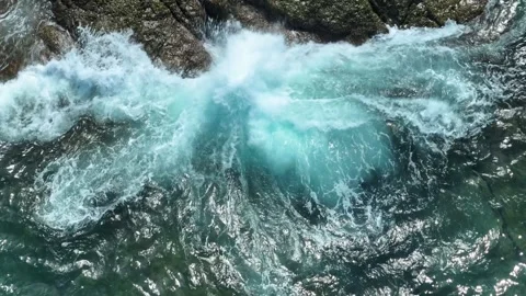A waves crashing forcefully over rocks. Stock Footage 307853255