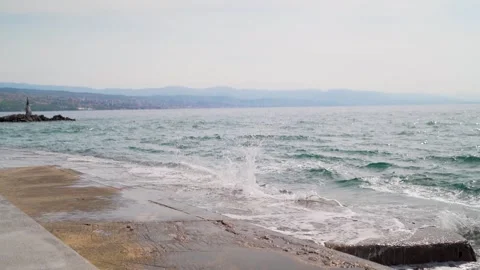 Waves crashing high during rough winds at Mediterranean sea Stock Footage 277720190