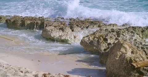 Waves crashing on the ironshore reef Stock Footage 80272093