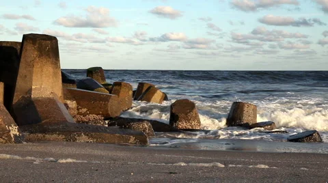 Waves Crashing onto Jetty in Ocean Stock Footage 920958