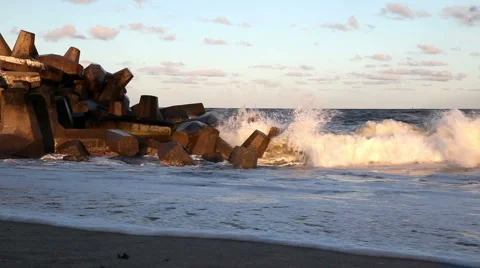 Waves Crashing onto Jetty in Ocean Stock Footage 920972