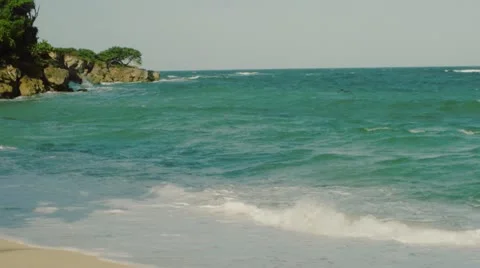 Waves crashing on ocean shore Stock Footage 11335803