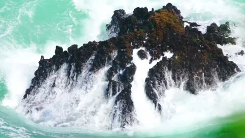 Waves Crashing Over Exposed Rock Reef Stock Footage 147431445