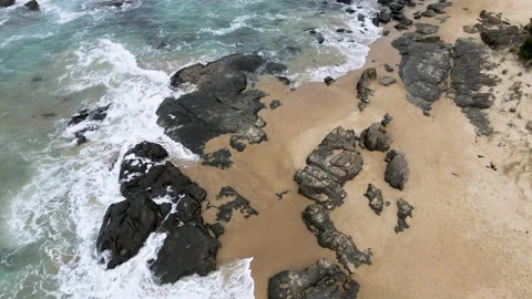 Waves Crashing Over Exposed Rocks Stock Footage 150251067