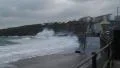 Waves crashing over rails in aftermath of Hurricane Gonzalo, seaside town HD Footage