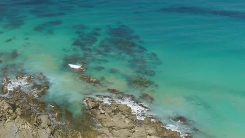 Waves Crashing Over Reef Below Video stock 303021649