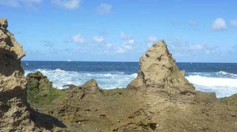 Waves crashing over rocks in Puerto Rico Stock Footage 60729300
