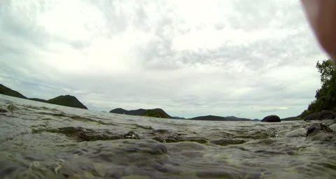 Waves crashing over the rocky shore Stock Footage 42881183