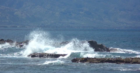 Waves Crashing over Three Tables on the North Shore of Oahu in Slow Motion Stock Footage 104374814