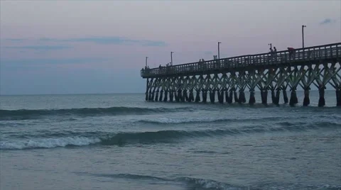 Waves Crashing On Pier At Sunset Stock Footage 53233017