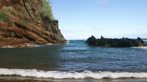 Waves Crashing on Red Sand Beach in Maui 4k 스톡 동영상 235581776