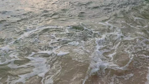 Waves crashing on the rock at the beach Stock Footage 279385689