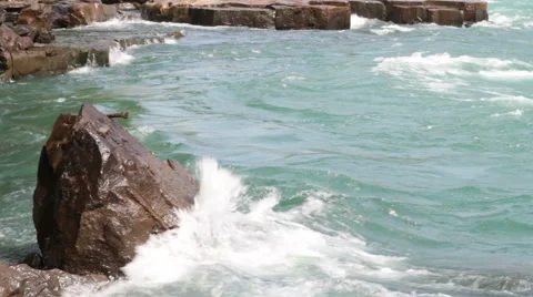 Waves crashing on a rock Stock Footage 41178421