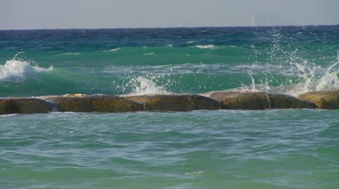 Waves crashing on rock Stock Footage 57814480
