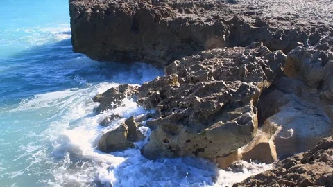 Waves crashing on a rock Stock Footage 108641704