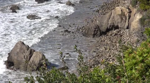 Waves crashing rocks at the beach - Pacific Ocean - Malibu, California Stock Footage 40135119