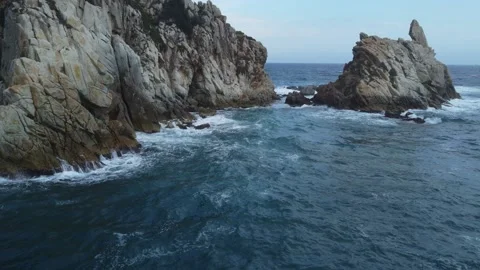 Waves crashing on the rocks, fixed aerial view Stock Footage 160551265