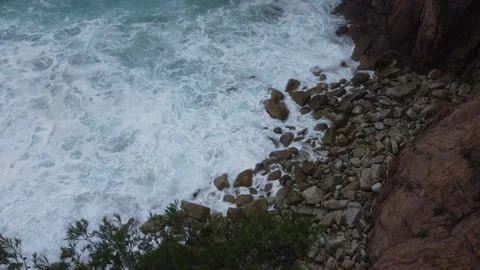 Waves crashing on the rocks, fixed aerial view Stock Footage 160593229