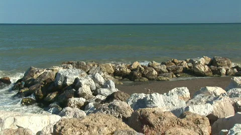 Waves crashing on rocks Stock Footage 398062