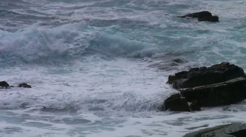 Waves crashing on rocks Stock Footage 973565