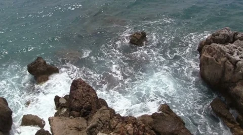 Waves crashing on rocks Stock Footage 8678495