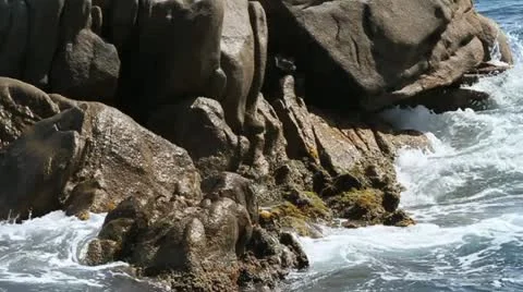 Waves crashing on rocks Stock Footage 12671032