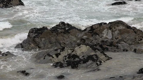 Waves crashing on the rocks Stock Footage 34048670