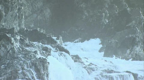 Waves Crashing on Rocks Stock Footage 37184137