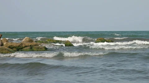 Waves crashing on rocks Stock Footage 48027665