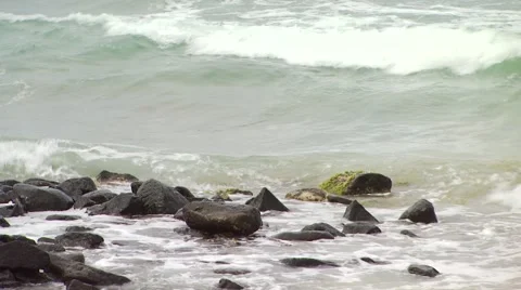 Waves crashing on rocks Stock Footage 54592635