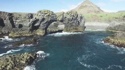 Waves crashing on rocks Stock Footage 69740993