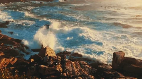 Waves crashing into rocks Stock Footage 78488287
