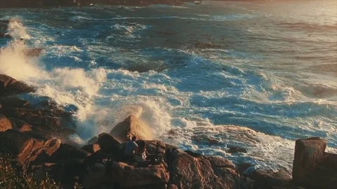 Waves crashing into rocks Stock Footage