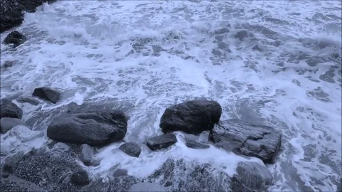 Waves crashing on rocks Stock Footage 81618058