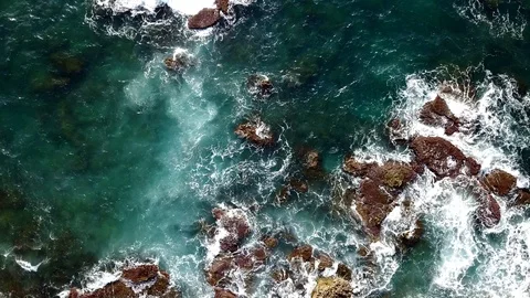 Waves crashing on rocks Stock Footage 86080851