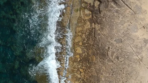 Waves crashing the rocks Stock Footage 97755750