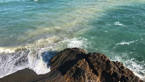 Waves crashing on rocks Stock Footage 99721888