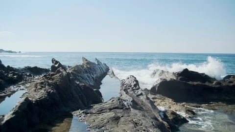 Waves Crashing on Rocks Stock Footage 101824617