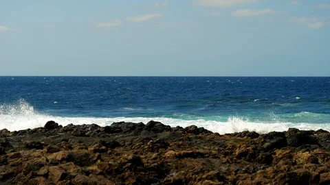 Waves crashing in to the rocks Stock Footage 105355113