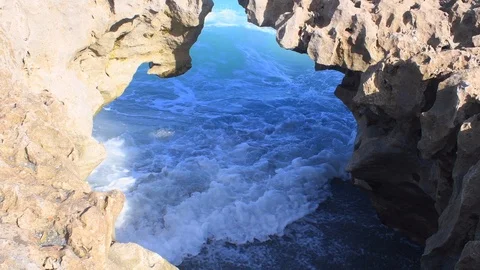 Waves crashing in the rocks Stock Footage 108641504