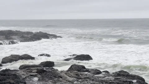 Waves crashing into rocks Stock Footage 156640347