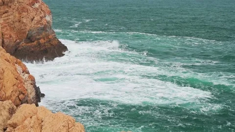 Waves crashing on rocks Stock Footage 204810192