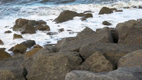 Waves crashing in to rocks Stock Footage 218349955