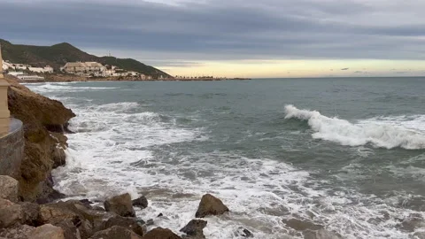 Waves crashing on to rocks Stock Footage 239657193