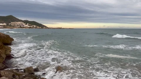 Waves crashing on to rocks Stock Footage 239657427