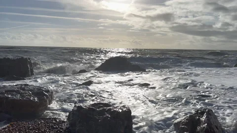 Waves crashing on to rocks Stock Footage 239658256