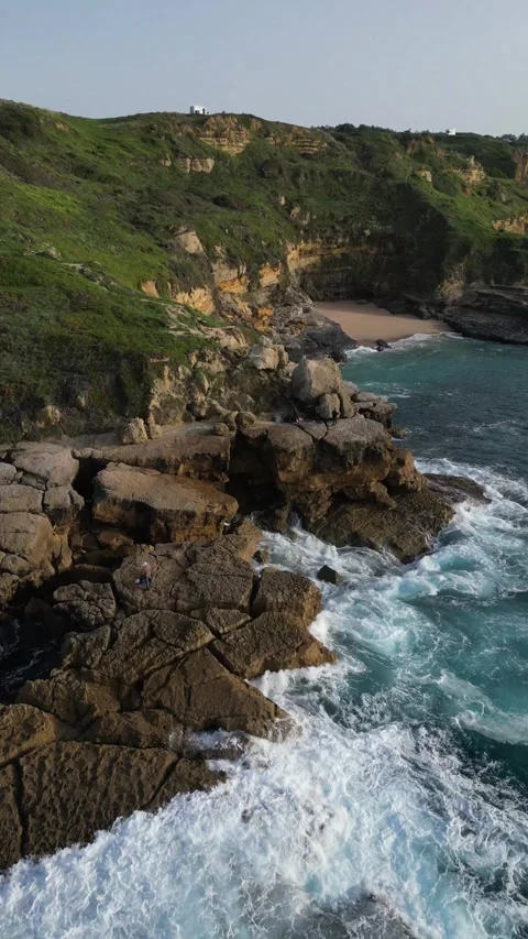 Waves crashing on rocks Stock Footage 299134905