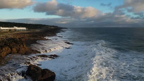 Waves crashing on rocks Stock Footage 299136145